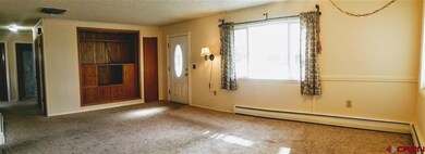 Spacious Living Room features Built-In Entertainme