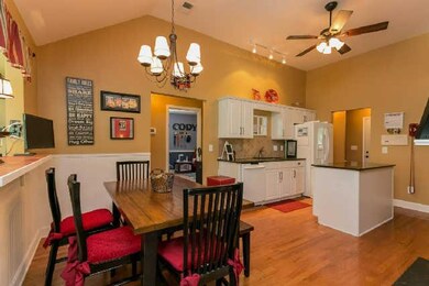 Large eat-in area in the kitchen with island, plenty of cabinets and countertops.