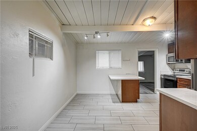 Kitchen featuring a peninsula, stainless steel app