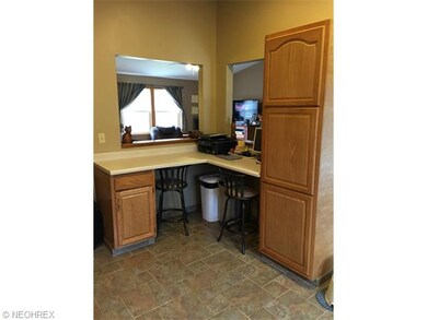Open to Living and Dining Room, breakfast bar and 