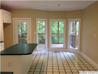 Large dining area in kitchen and access to screene