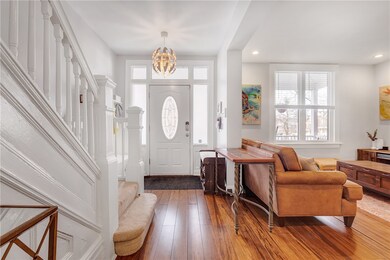Hardwood floors carry throughout the main level.