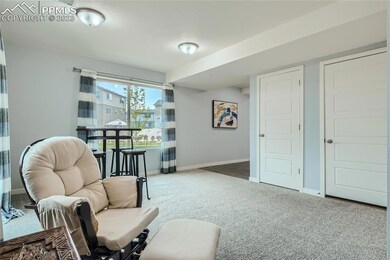 Another view of the lower level rec room with door