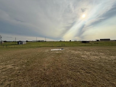 View of yard with a view of countryside