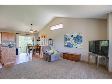 Vaulted ceilings and an open concept floor plan ma