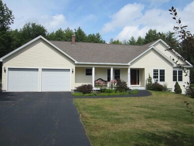 Paved driveway and two car garage!