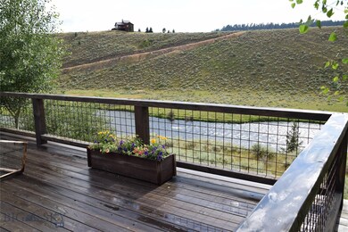 View off the deck of the river and property across