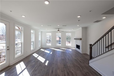 As you reach the main floor, you are instantly drawn to all the windows and the open family room, dining and kitchen.