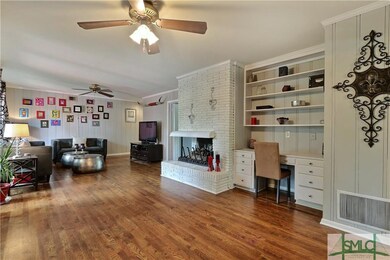 VERY LARGE FAMILY ROOM OVERLOOKING DECK WITH LARGE