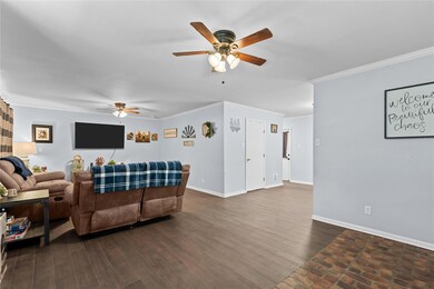 Living room featuring dark hardwood / wood-style f