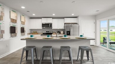 Kitchen with appliances with stainless steel finis