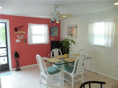 Dining Room. Upon Entry from the West, the Cheerfu