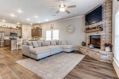 Living room is open to kitchen.