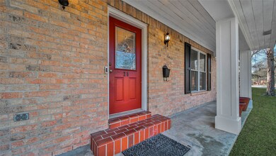 The oversized front porch creates great curb appeal for this home and is a wonderful place to sit and sip your morning coffee.