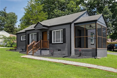 Bungalow-style house featuring a front lawn, roof