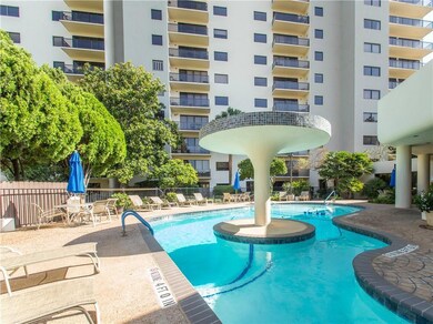 Community pool with a patio area