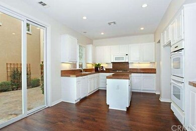 Kitchen upgrades include center island, granite, a
