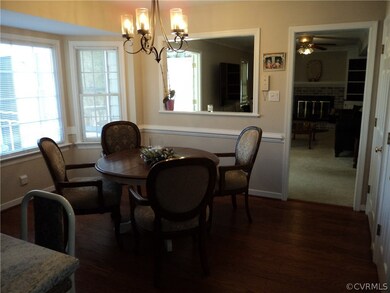 Eat-in kitchen, lovely hardwood floors.