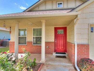 Doorway to property with cooling unit and a porch