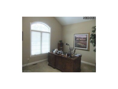 Located to the left of the foyer is the home's fir