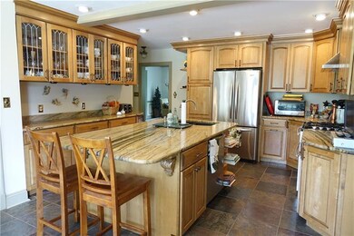 Remodeled Eat-in-kitchen with abundant cabinetry, 