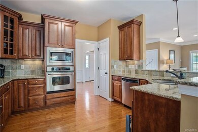 This considerable sized kitchen has a built in ove