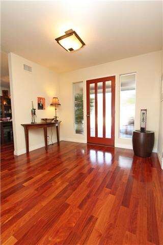 Dramatic door, spacious and welcoming entryway.