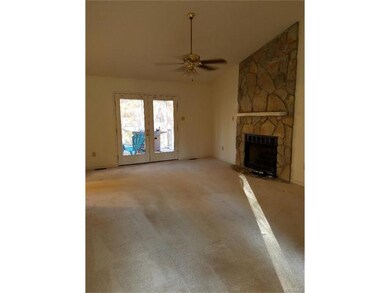 Large Living area with Stone Gas fireplace with Go