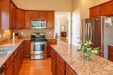 Stainless steel appliances in the kitchen.