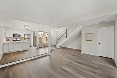Spacious living space open to kitchen
