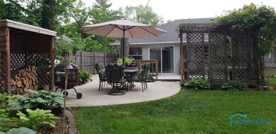 Backview, sliding glass doors from the Sunroom, to