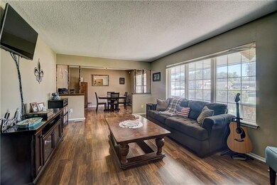 Formal living space with new flooring.