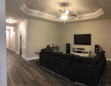 With trey ceiling and crown molding