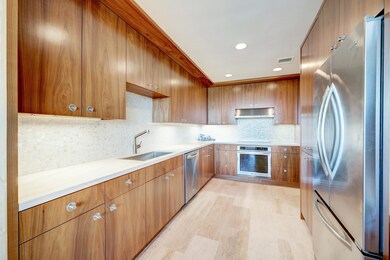 The kitchen includes features such as stainless st