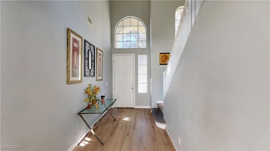 Foyer featuring visible vents, a healthy amount of