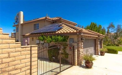 Large gated RV parking with block wall