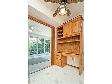 Kitchen. Built in desk between Kitchen and Sun Room is the perfect spot for a small home office!