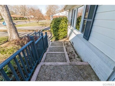 The wood/paved front steps are tiered, as previous