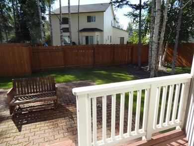 Fenced back yard w/deck and patio