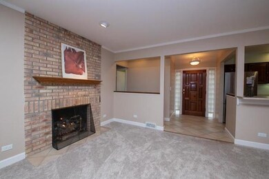 Foyer and beautiful brick fireplace (gas) - this i