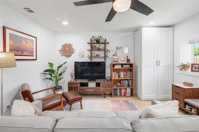 Living area featuring light wood-style flooring, 