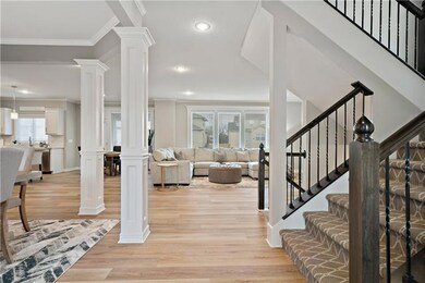 Entry, new flooring through main level