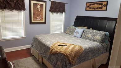 Master bedroom.  A great touch is that there are T