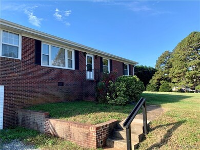 View of front of property featuring a front lawn