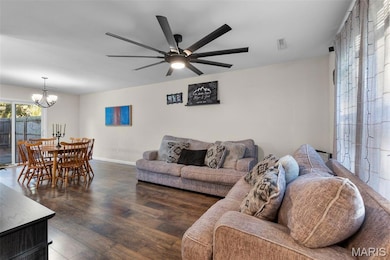 With double windows in front and patio doors in back, the open floor plan is bathed in natural light.
