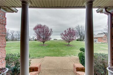 View out the Front Porch; Detached Garage on right!