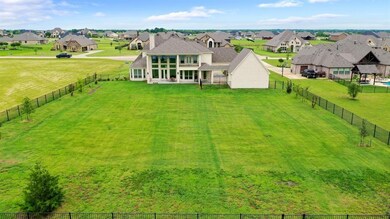 Fully fenced backyard.