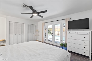 Bedroom featuring french doors, access to exterior