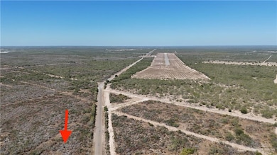 Aerial view of sparsely populated area near airstrip