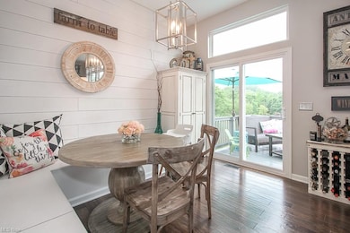The built-in dining area with shiplap walls and bu